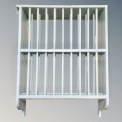 A painted kitchen wall rack, width 62 cm.