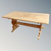 A Scandinavian blonde oak refectory dining table (missing pegs)