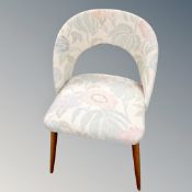 A 20th century Scandinavian chair in floral fabric