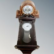 A Decoz Quartz decorative mantel clock and a wall clock