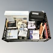 A box of JVC digital video camera, fishing reels, art set,