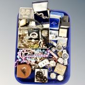 A tray of vintage and later watches, costume jewellery, faux pearls,