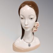A Lladro bust of a lady,