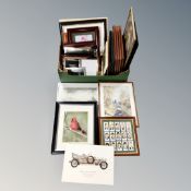 A box of assorted pictures and prints of birds, impressions, photo frames,