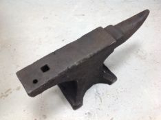 An antique cast iron anvil