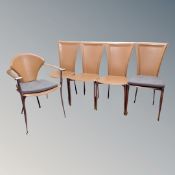 Four Danish brown stitched leather dining chairs on metal legs and a similar armchair