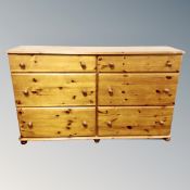 A pine six drawer block chest