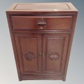 A contemporary Chinese cherry wood double door cabinet