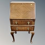 A 20th century Queen Anne style bureau