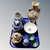 A Satsuma lidded pot on stand, blue and white prunus ginger jars,