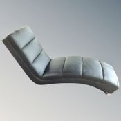 A black leather chaise longue (a/f) CONDITION REPORT: Leather somewhat distrsssed.