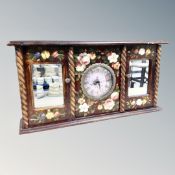 A contemporary Quartz mantel clock with two mirrored doors