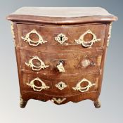 A 19th century continental walnut serpentine front three drawer apprentice chest, width 33 cm,