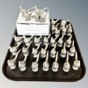 A collection of silver plate on pewter pheasant sifters and place card holders.