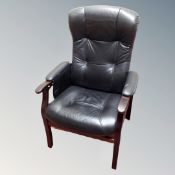 A Scandinavian armchair in black leather