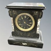 A Victorian black slate and marble mantel clock