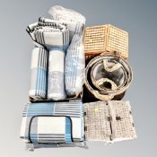 A box of seven new picnic blankets, two wicker picnic boxes,