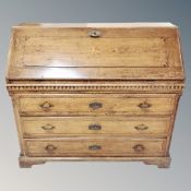 A 19th century inlaid oak fall front bureau fitted three drawer beneath