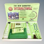 A Subbuteo table soccer International Edition,