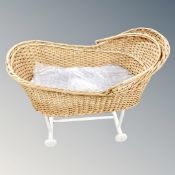 A 20th century wicker Moses basket on stand