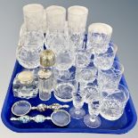 A tray of crystal glasses, rummers, sifters, two magnifying glasses .