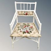 A 20th century painted bamboo armchair