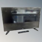 A Bush 32 inch TV with remote