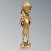 A contemporary bronzed figure of a girl