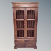 An eastern hardwood double door cabinet