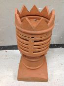 A crown chimney pot