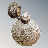 A silver mounted cut glass perfume bottle,