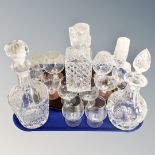 A crystal decanter and set of rummers on twin handled tray together with further decanters and