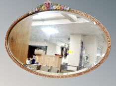 A Barbola style oval wall mirror width 91 cm