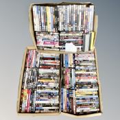 Three boxes containing approximately 150 DVD's