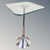 A contemporary Umbra metal and glass occasional table designed by David Quan height 57 cm