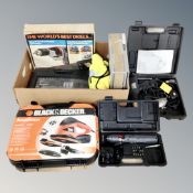 A box of boxed and cased drill, Black and decker sander, Performance heat gun,