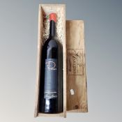 A bottle of Tenuta Garetto wine in wooden lidded crate 1.