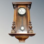 A late 19th century eight day wall clock