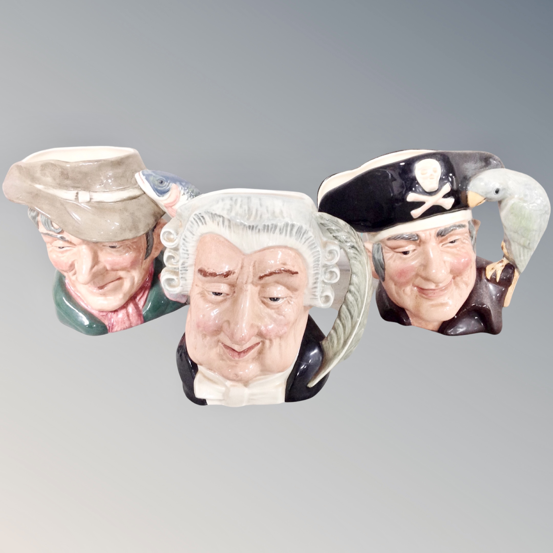 Three Royal Doulton character jugs : The Lawyer, The Poacher,