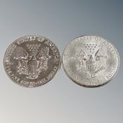 Two American silver Liberty dollars,