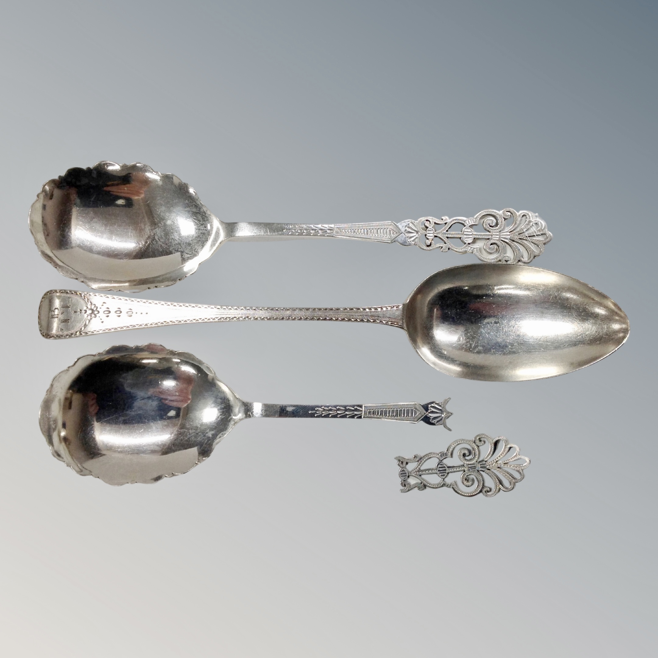 A silver serving spoon, London 1830,