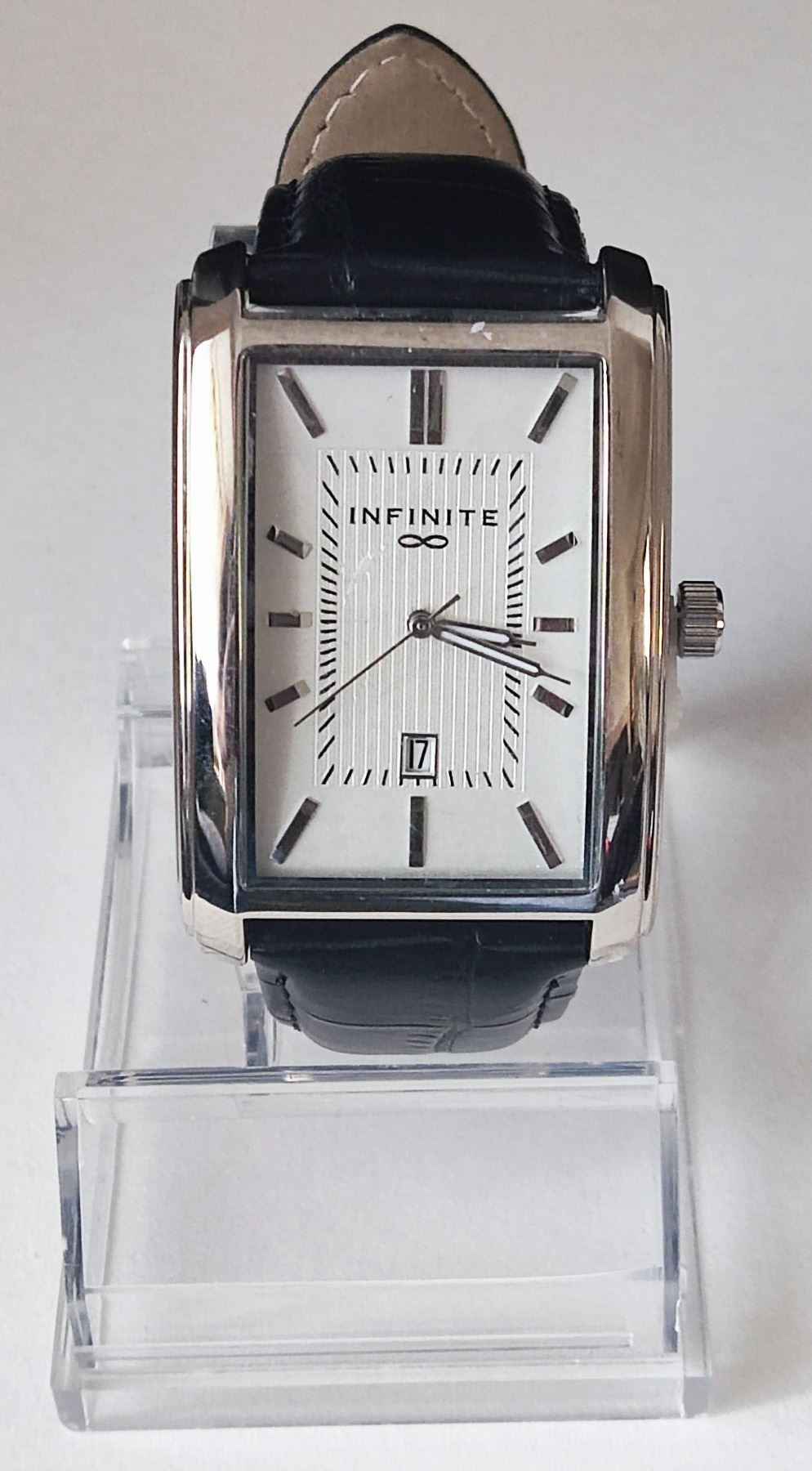 New Infinite gent's watch. Model: 5248-60 z rg. Rectangle face 1.25 x 1.5 inches.