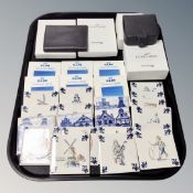 A tray of KLM Business Class Belft tiles, two Concorde British Airways leather wallets,