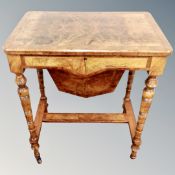 A Victorian figured walnut and birdseye maple work table,