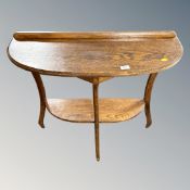 An oak D-shaped hall table width 84 cm