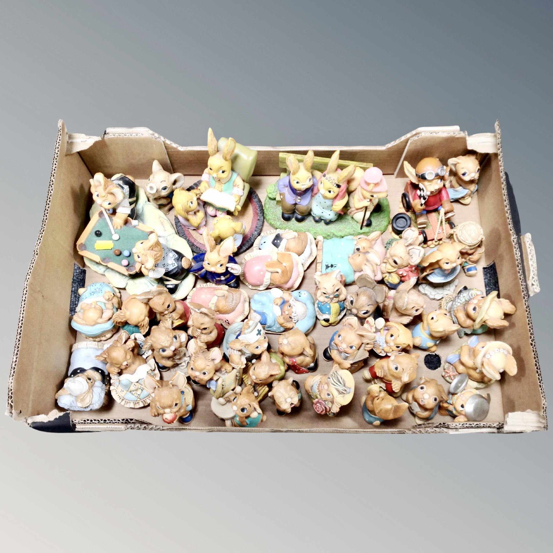 A box of Pendelfin rabbit figures