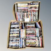 Three boxes containing approximately 150 DVD's