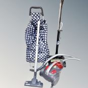 A Hoover cylinder vacuum,