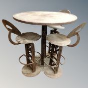 An Industrial metal circular pub table and three matching chairs