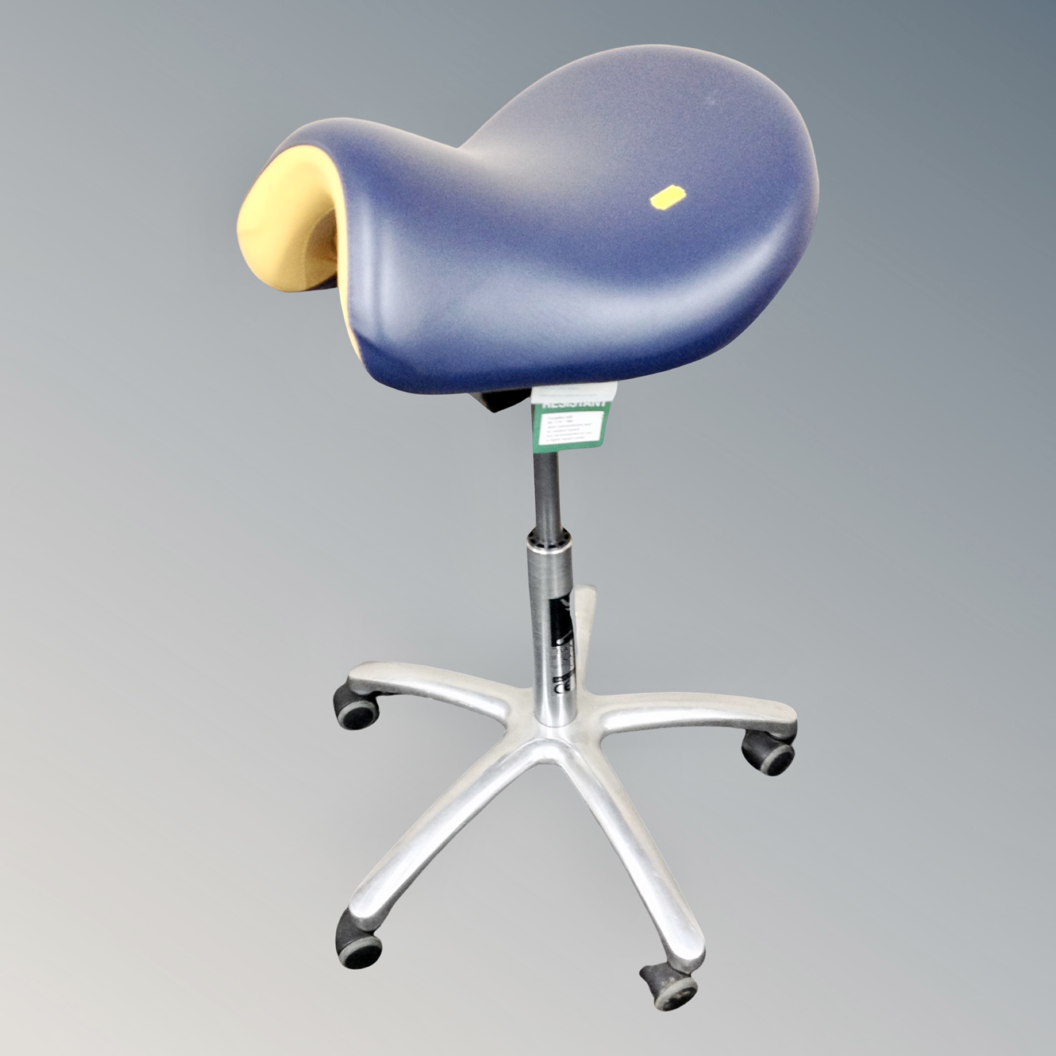 A Sambach gas lift saddle stool